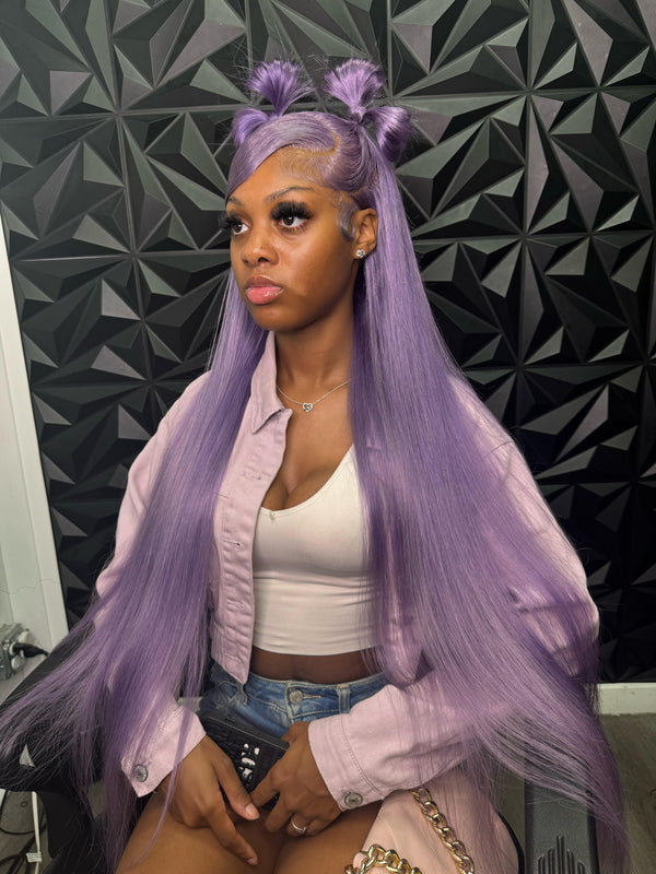 Model showcasing the Itty X Romanjay Fall Color Wig in lavender, styled with casual fashion for a trendy look.