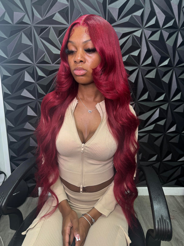 Influencer Itty showcasing the Itty X Romanjay Fall Color Wig in vibrant red, perfect for fall styling.